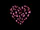Heart formed of bright pink hearts spaced apart (open your heart) on black background.
